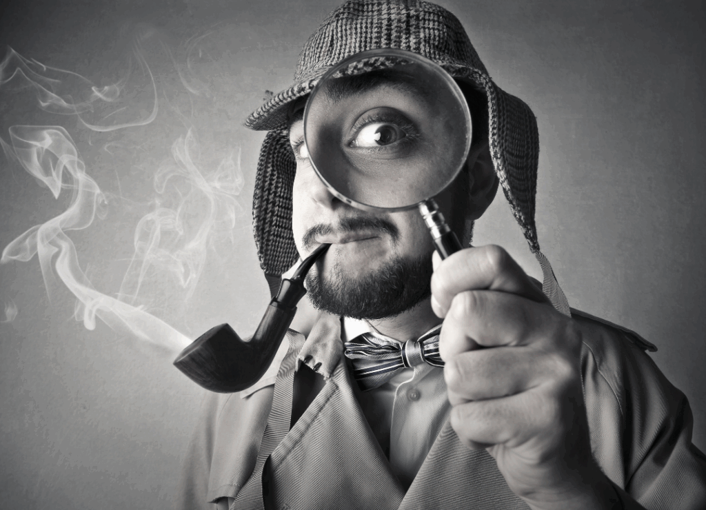 Representación simbólica de un detective privado con lupa y pipa en actitud inquisitiva
